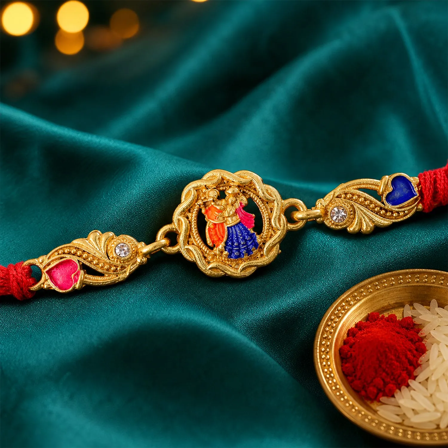 Premium Gold-Toned Radha Krishna Rakhi with Multicolor Enamel, Crystal Accents & Red Thread - Buy Online at Alikart