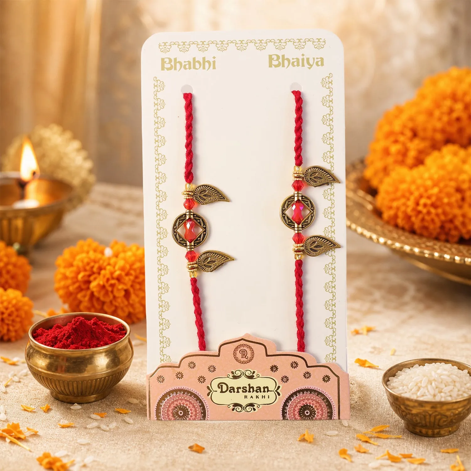 Classic Geometric Square Bhai Bhabhi Rakhi with Gem Center and Leaf Charms for Gift - Detailed Feature View 1