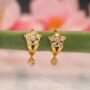 Premium Gold Plated Star & Flower Dangle Huggie Earrings – Set of 2 for Stylish Everyday Wear - Buy Online at Alikart
