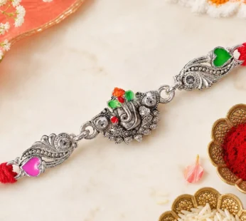 Silver-Toned Lord Ganesha Rakhi with Floral Design, Crystal Accents & Designer Red Thread