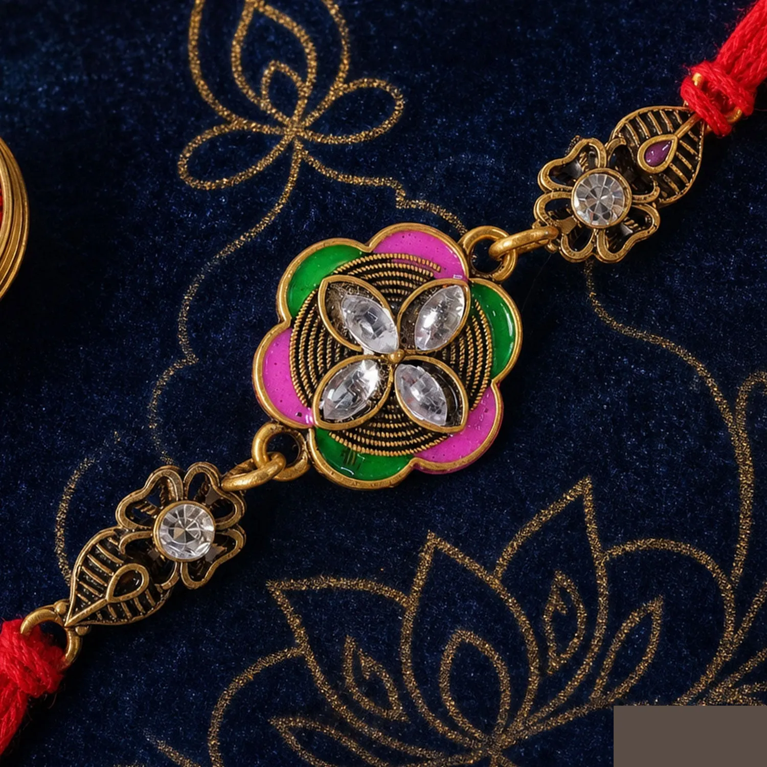 Premium Ornate Rakhi with Floral Medallion, multicolor stones and chain look for Gifting - Buy Online at Alikart