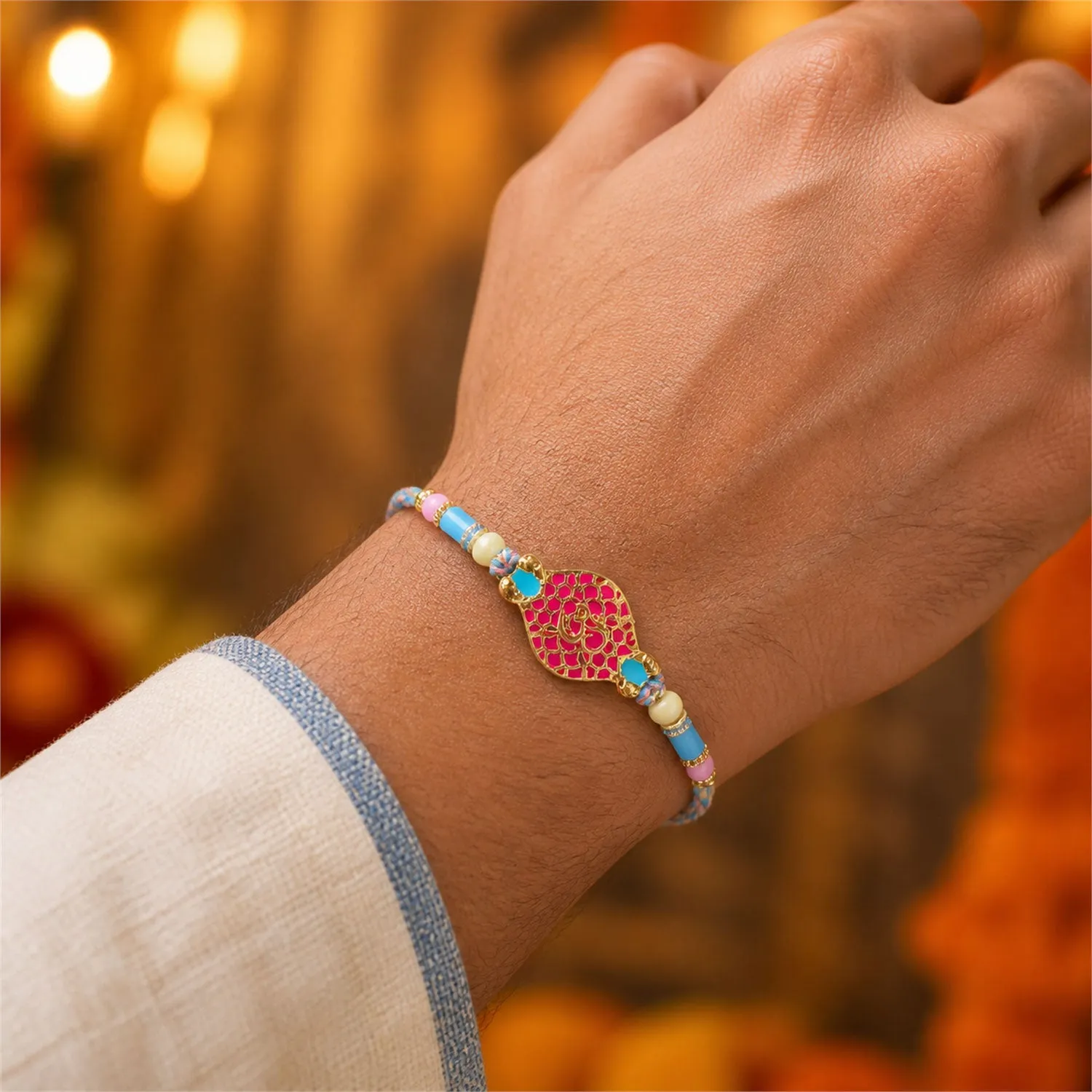 Festive Rakhi with Paisley Heart Charm, blue stones and wrist style for Gift Use - Detailed Feature View 3