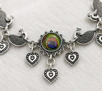 Oxidized Silver Peacock Feather Adjustable Bracelet with Carved Peacock Motifs & Heart Dangles