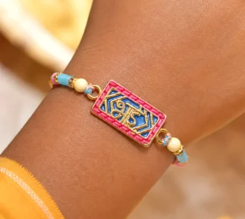 Classic Rakhi showcasing Shubh Plaque, crystal accents and plaque look for Gift Use