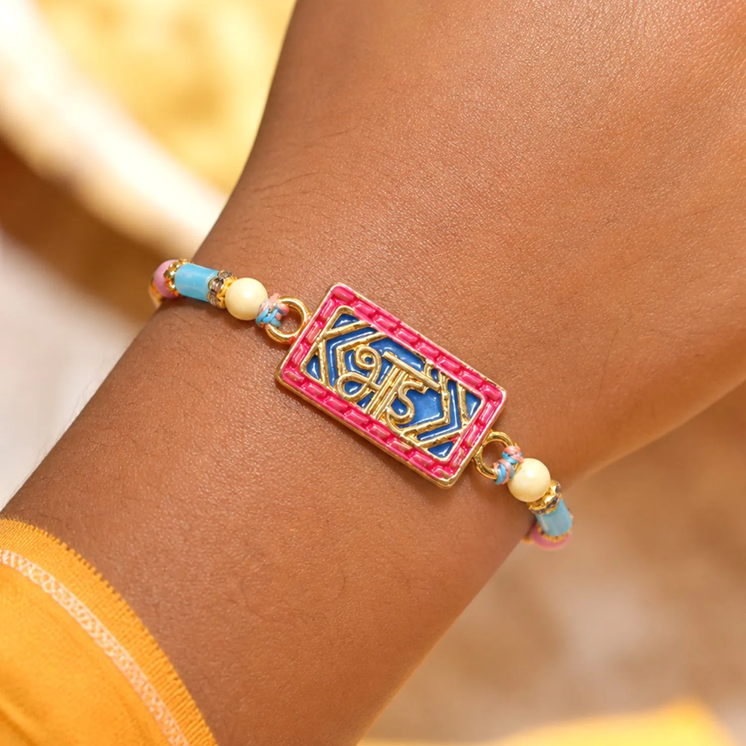 Premium Classic Rakhi showcasing Shubh Plaque, crystal accents and plaque look for Gift Use - Buy Online at Alikart