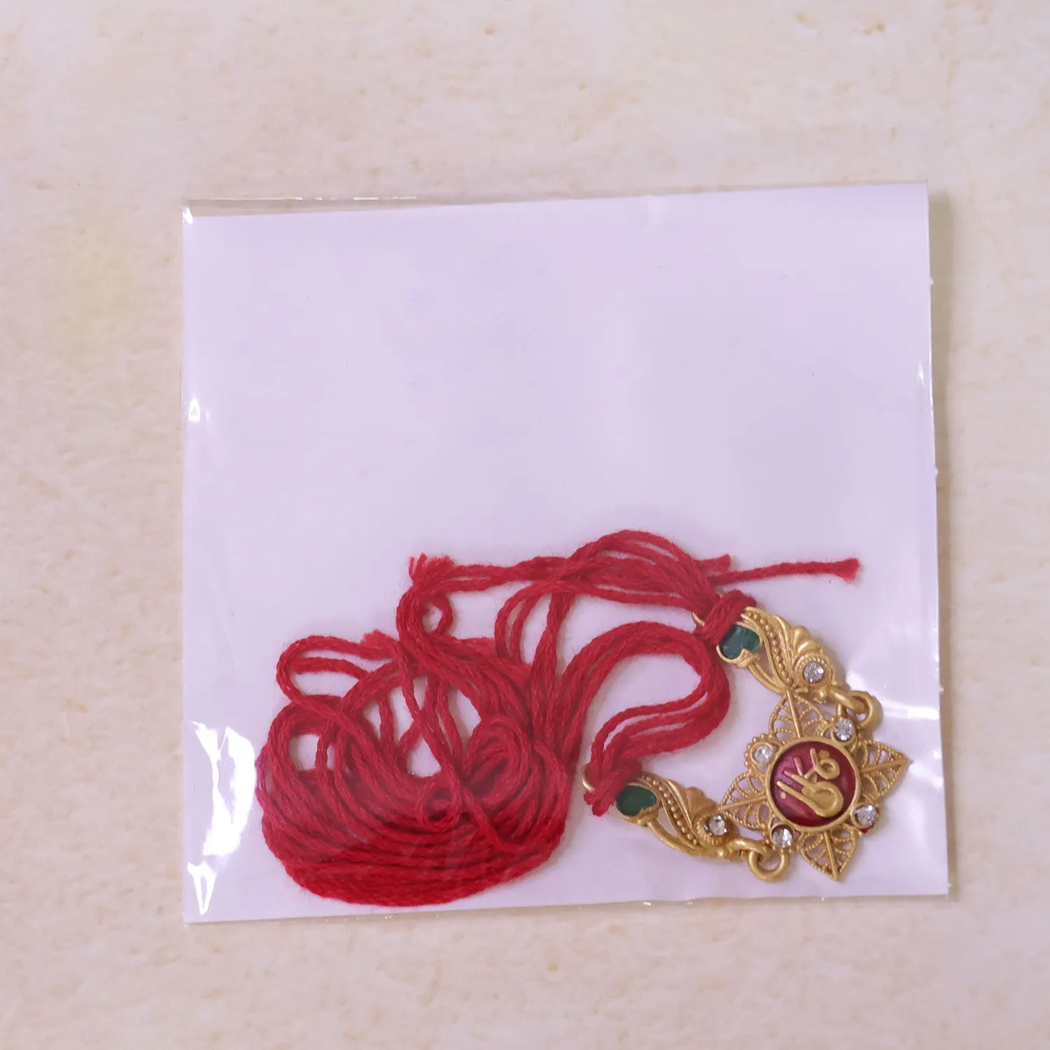 Classic Rakhi with Shri Plaque, ornate work and thread style for Product Display - Detailed Feature View 5