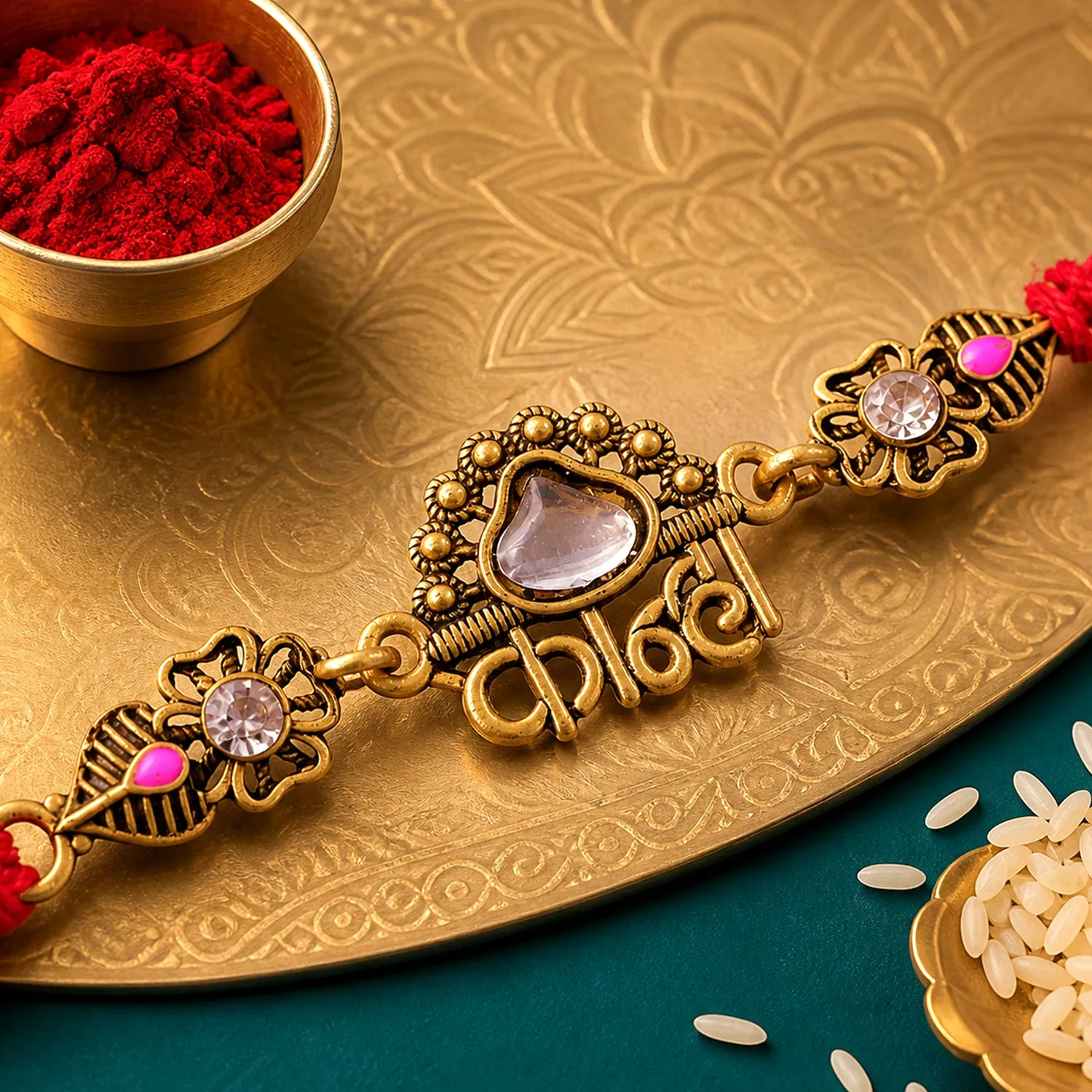 Premium Antique Gold-Toned Kanha Rakhi with Kundan-Style Stone, Crystal Accents & Red Thread - Buy Online at Alikart
