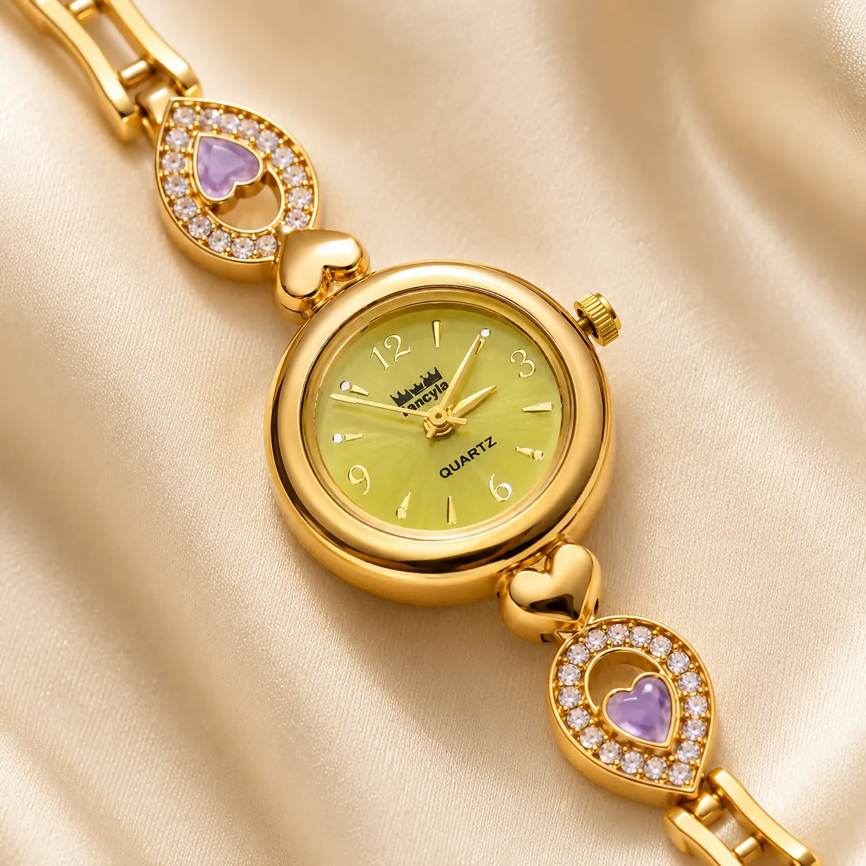 Elegant Gold-Tone Bracelet Watch with Pastel Yellow Dial and Purple Heart Accents - Detailed Feature View 2