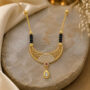 Premium Regal Gold-Plated Mangalsutra Necklace | Ruby & Dazzling Crystal Teardrop Pendant for Women - Buy Online at Alikart