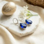 Premium Sapphire Blue Teardrop Crystal Dangle Earrings with Silver Tone Leverback Hooks - Buy Online at Alikart