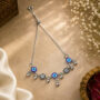 Premium Vintage Antique Silver Bracelet featuring Blue Evil Eye Charms, Carved Flower Links, & Dangling Silver Balls - Buy Online at Alikart