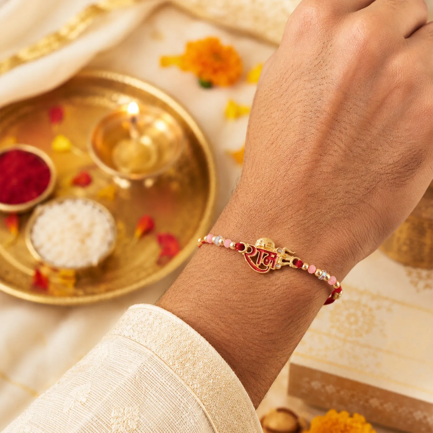 Golden Ram Rakhi – Elegant Festival Gift for Brother & Sister - Detailed Feature View 1
