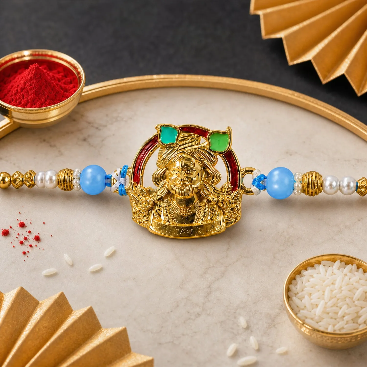 Premium Gold-Toned Khatu Shyam Rakhi with Blue and Pearl Beads for Raksha Bandhan - Buy Online at Alikart
