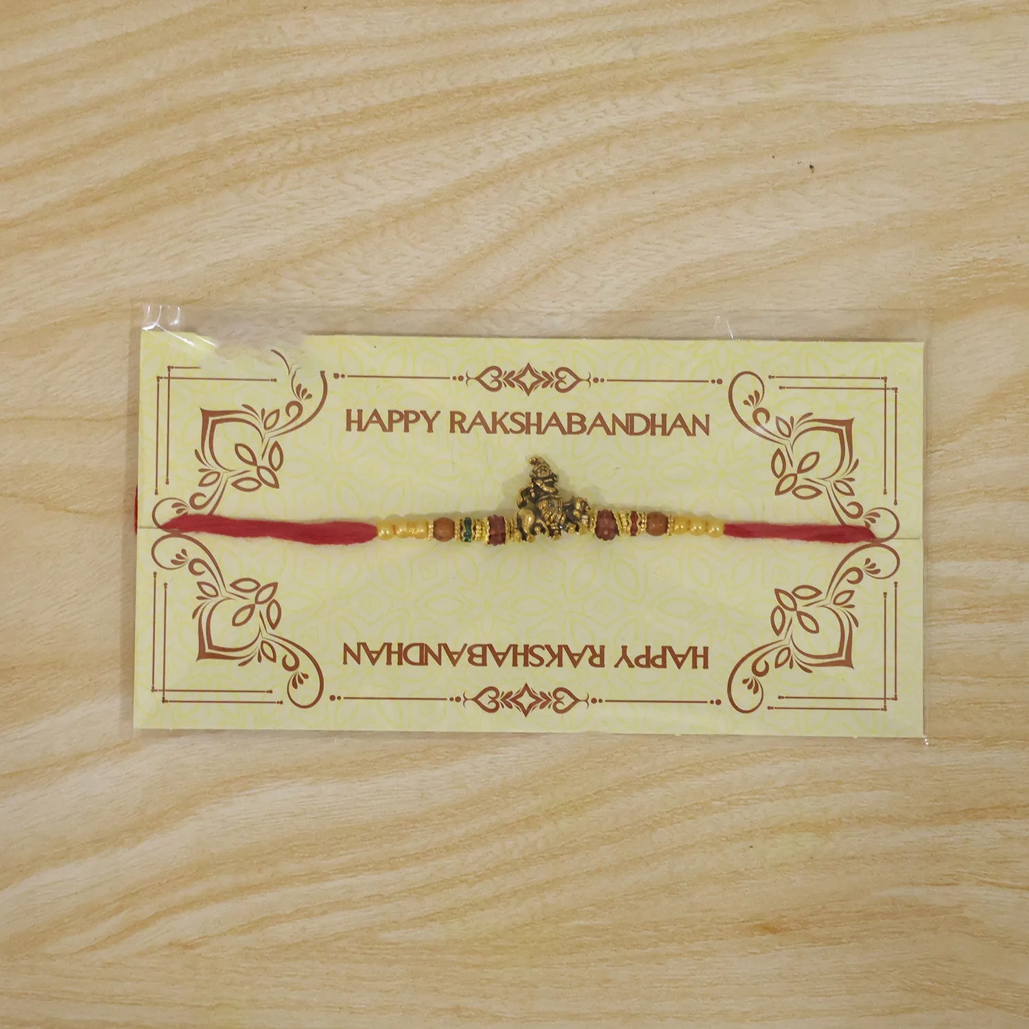 Bal Krishna Rakhi – Golden Idol Centre & Pearl Accents - Detailed Feature View 5