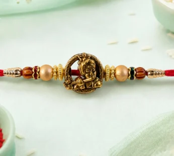 Kanha Name Devotional Rakhi with Golden Flute and Red Thread