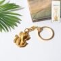 Premium Ganesh Keychain – Durable Golden Leaf Design Accessory - Buy Online at Alikart