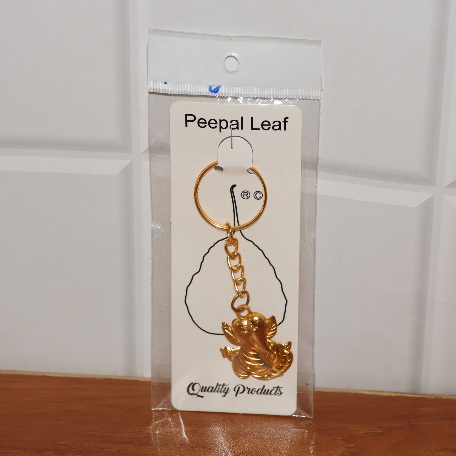 Ganesh Keychain – Durable Golden Leaf Design Accessory - Detailed Feature View 6