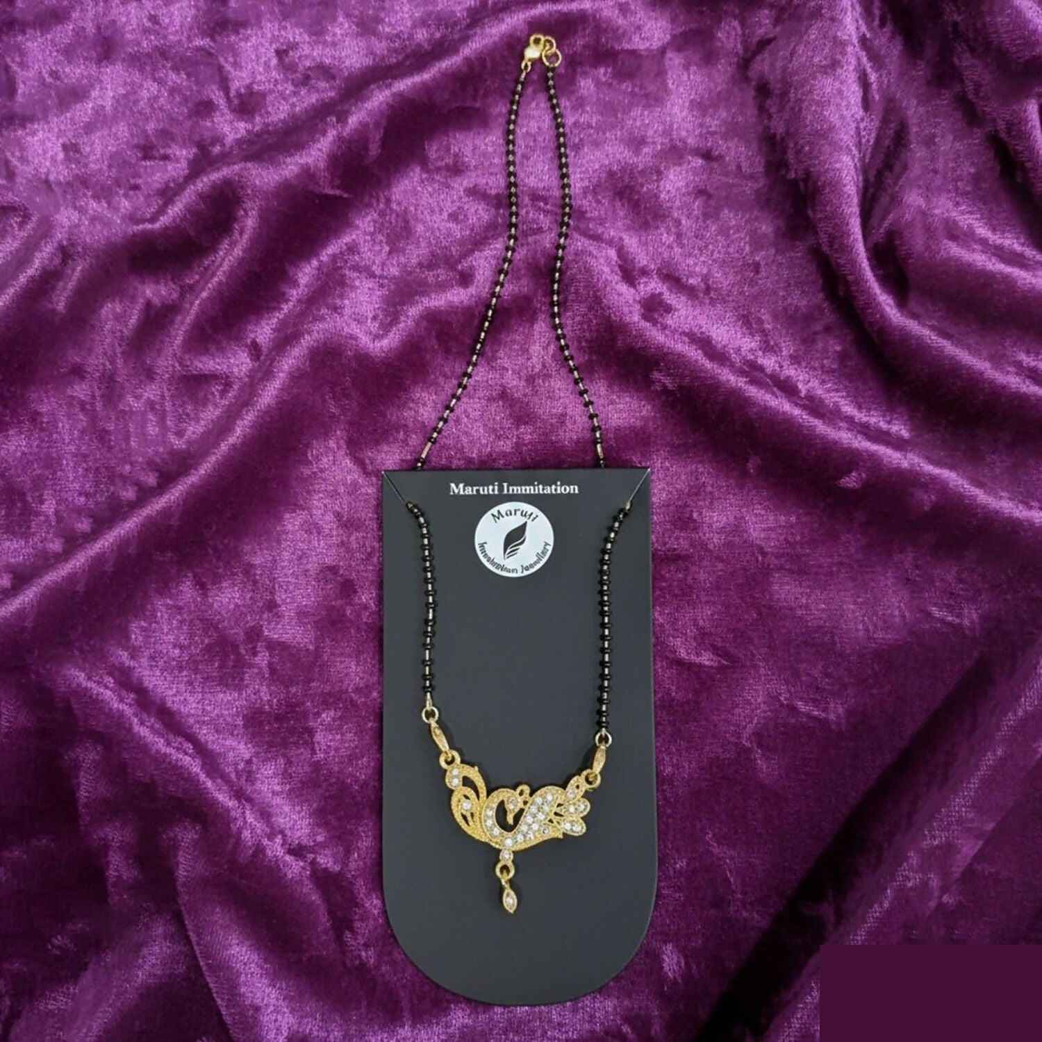 Radiant Dual Swan Gold-Plated Mangalsutra with Dazzling Crystal Pendant - Detailed Feature View 2