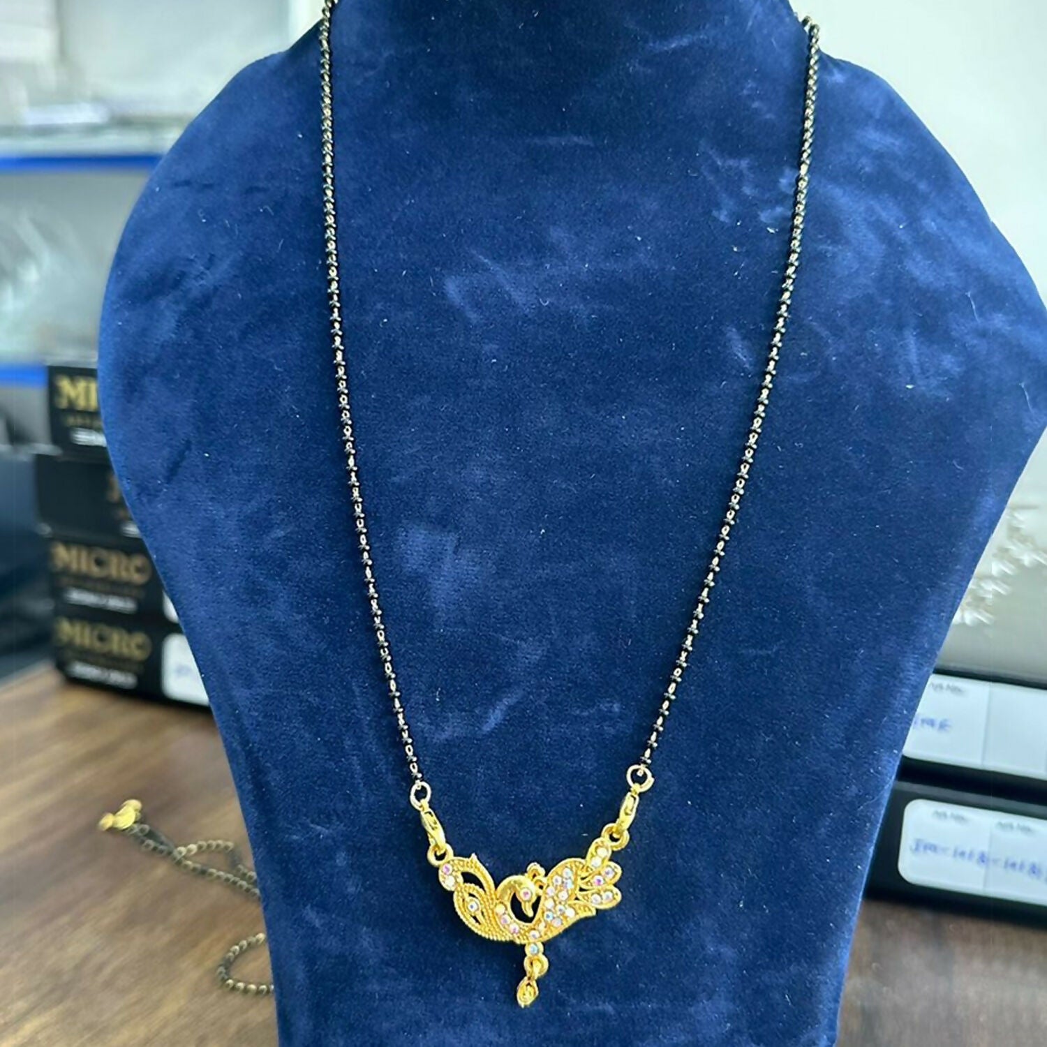 Radiant Dual Swan Gold-Plated Mangalsutra with Dazzling Crystal Pendant - Detailed Feature View 3