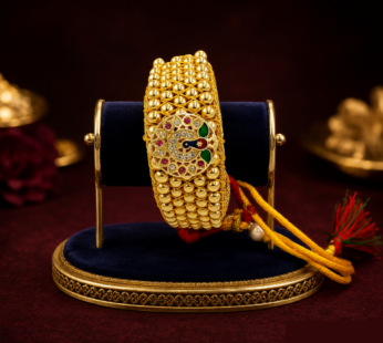 Royal Rajasthani Golden Bead Poochi Wristband with Peacock Meenakari Round Medallion