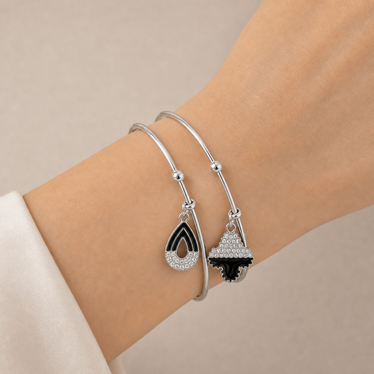 Silver Bangle Bracelets with Teardrop and Clover Black Stone Charms - Detailed Feature View 1