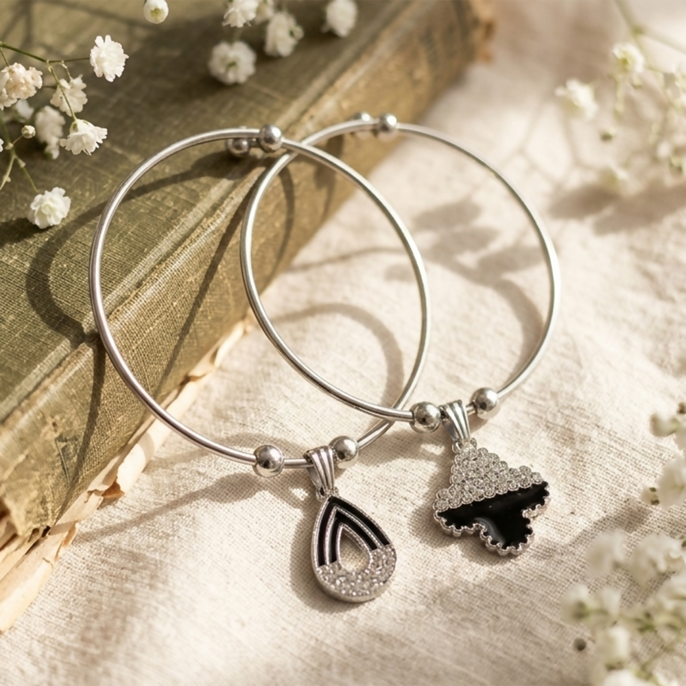Silver Bangle Bracelets with Teardrop and Clover Black Stone Charms - Detailed Feature View 2
