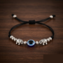 Premium Silver Elephant Evil Eye Blue Bead Black Cord Adjustable Bracelet for Women and Girls - Buy Online at Alikart