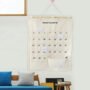 Premium Wall Pocket Calendar Hanging Organizer – Monthly Day-Wise Planner with Clear Pockets for Saving Important Dates & Special Reminders - Buy Online at Alikart